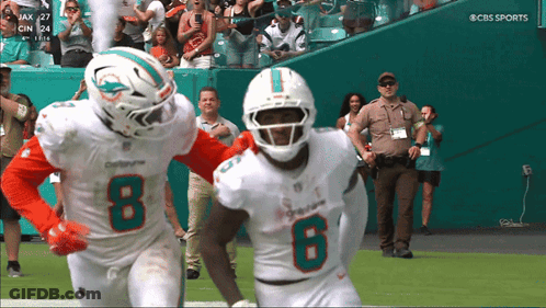 Miami Dolphins Players Running GIF