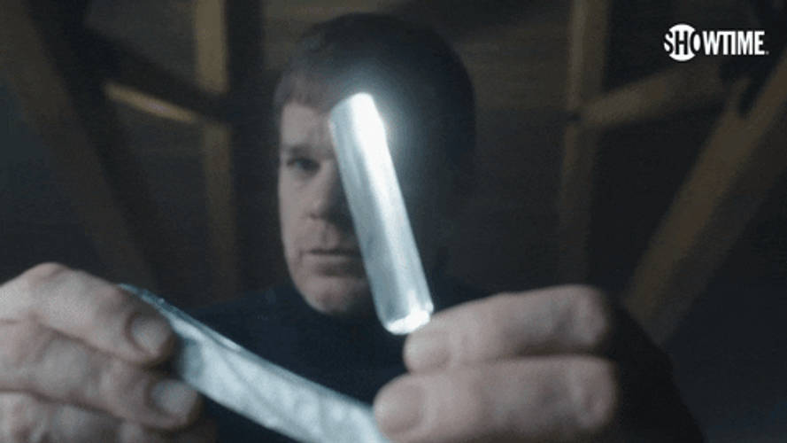 Michael C. Hall Showing Sharp Blade GIF