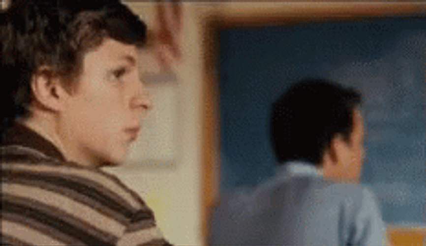 Michael Cera Of Superbad Is Looking On His Classmate GIF