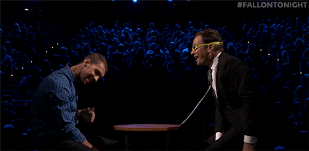 Michael Phelps In A Table With Jimmy Fallon GIF