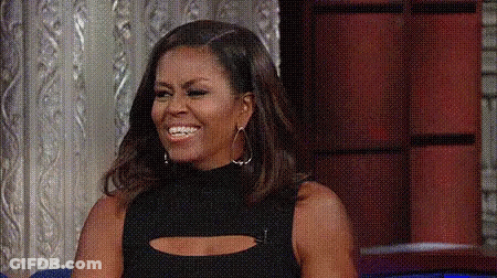 Michelle Obama Smiling On Couch GIF