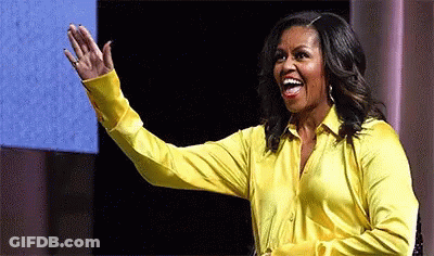 Michelle Obama Waving In Yellow Shirt GIF