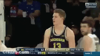 Michigan Basketball Player Talking To Another GIF