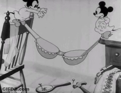 Mickey And Minnie Mouse Sitting In Hammock GIF