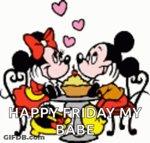 Mickey Mouse And Minnie Mouse Are Sitting At A Table With A Cupcake . GIF