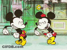 Mickey Mouse And Minnie Mouse Dancing In Front Of Store GIF