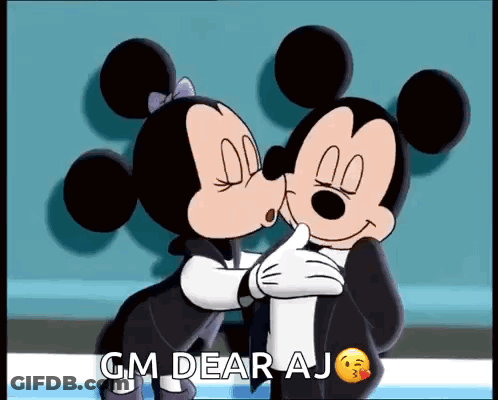 Mickey Mouse And Minnie Mouse Kissing And Hugging With The Words Gm Dear Aj GIF
