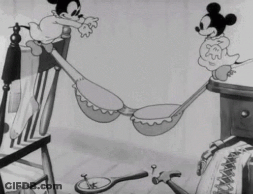 Mickey Mouse And Minnie Mouse Laying In Hammocks GIF