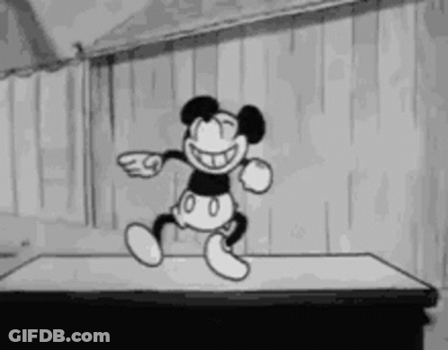 Mickey Mouse Dancing On Table GIF