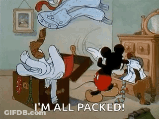 Mickey Mouse Is Standing Next To A Trunk Filled With Clothes And Saying `` I 'M All Packed ! '' GIF