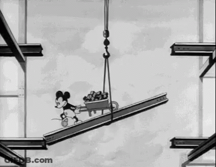 Mickey Mouse Riding Crane On Metal Beam GIF