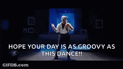 Mickey Mouse Standing Next To A Door GIF