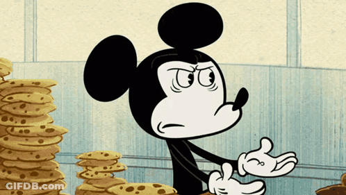 Mickey Mouse Standing Next To Pancakes GIF