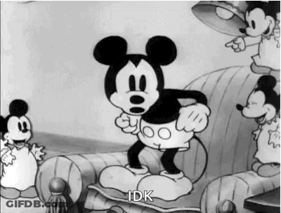 Mickey Mouse Standing On Chair Black And White GIF