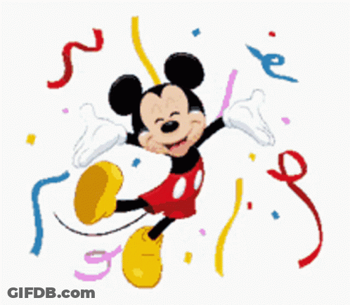 Mickey Mouse Surrounded By Confetti And Streamers GIF