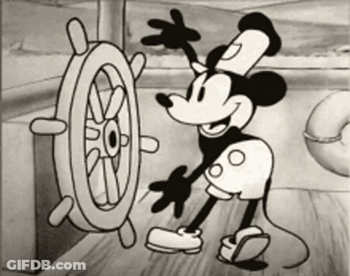 Mickey Mouse Waving At Steering Wheel GIF