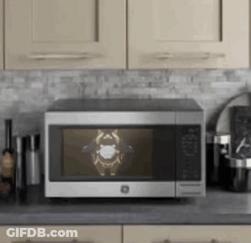 Microwave Oven With Cartoon Character On Screen GIF