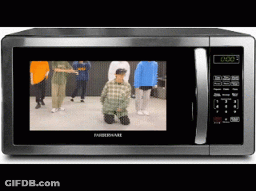 Microwave Showing Dancing People At 0:00 GIF