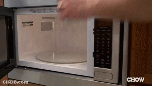 Microwave With Girl On Screen At 2:01 GIF