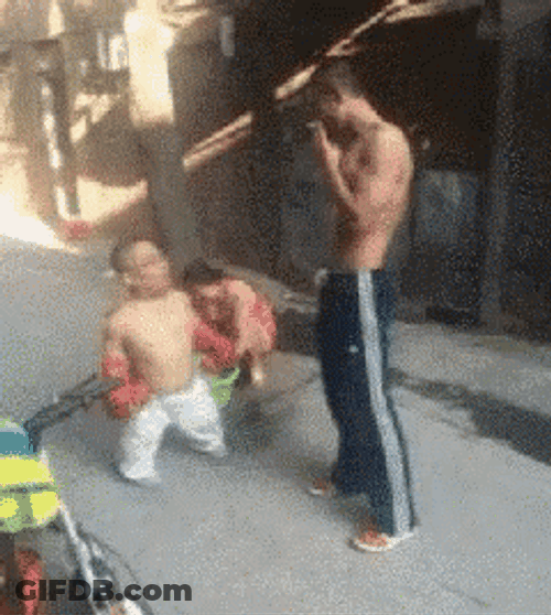 Midget Fight Punch Funny Falling Water Bucket GIF