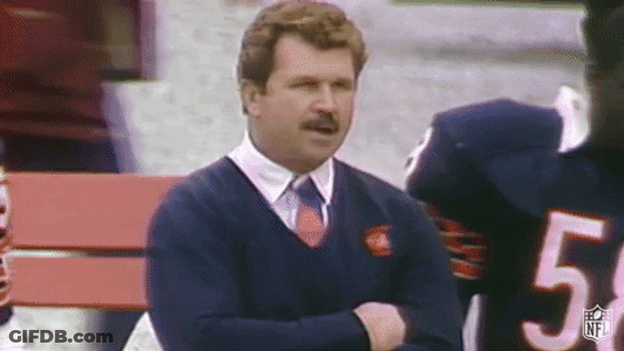 Mike Ditka Fiercely Chewing GIF