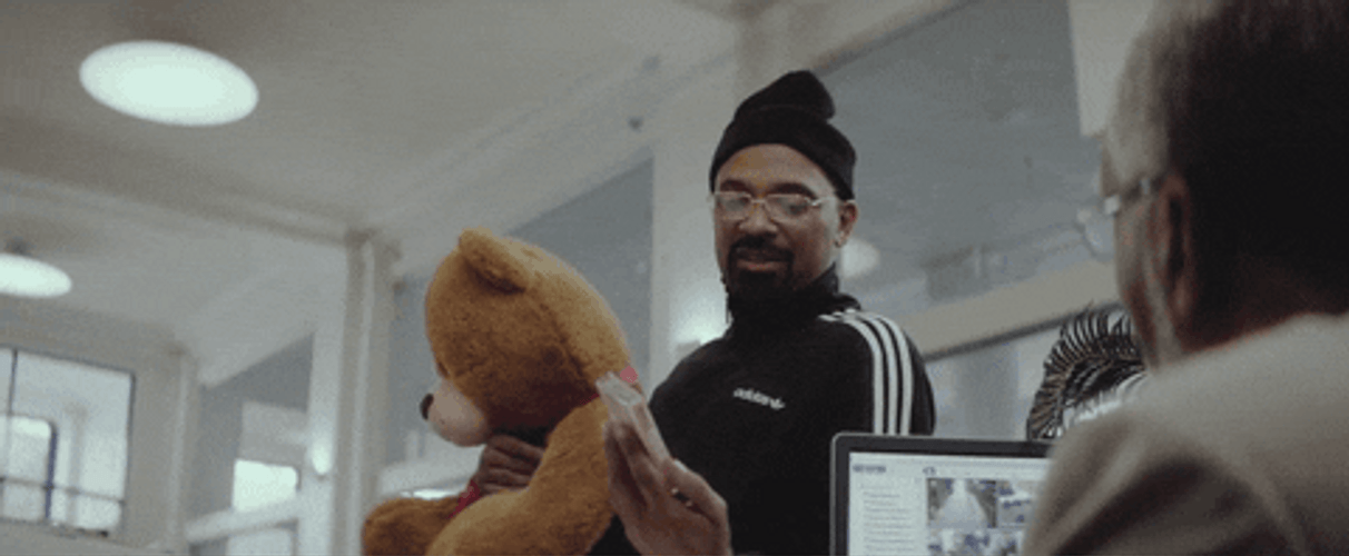 Mike Epps Hugging Big Stuffed Toy GIF