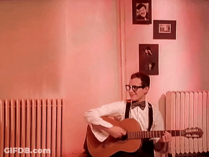 Mike Smashing Guitar On Wall GIF