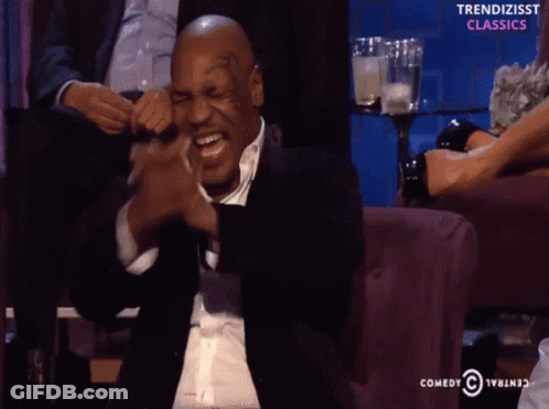 Mike Tyson Laughs In Front Of Comedy Central Logo GIF