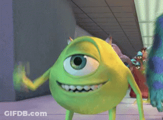 Mike Wazowski From Monsters Inc Waving His Hand GIF