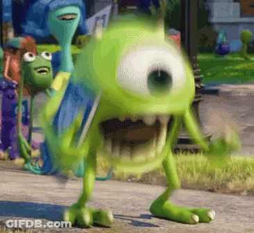 Mike Wazowski Standing On Sidewalk GIF