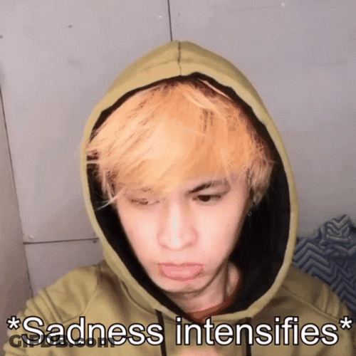 Mikoy Rubbing Face Presenting Sadness GIF