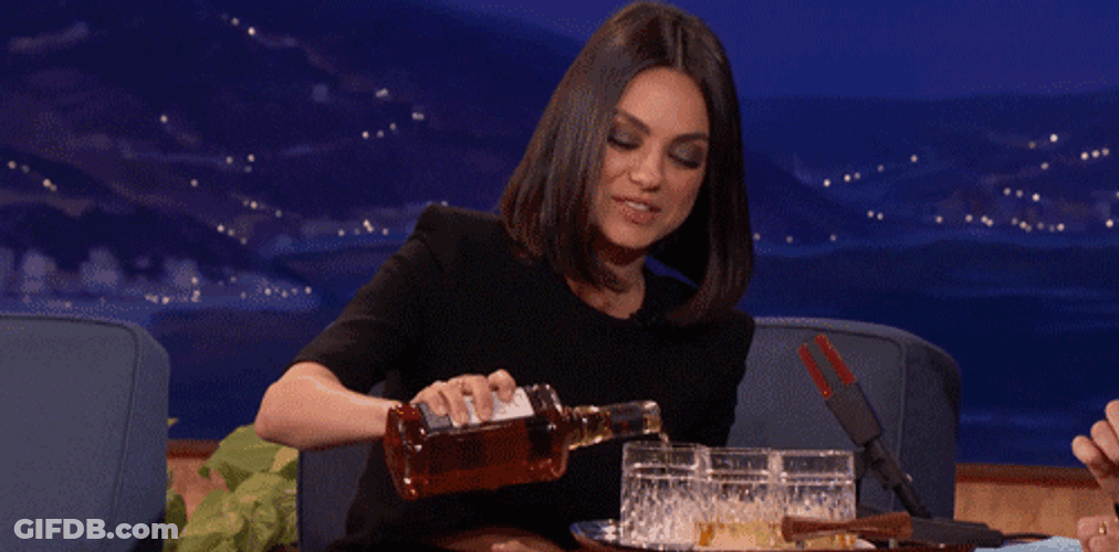 Mila Kunis Pouring Liquor GIF
