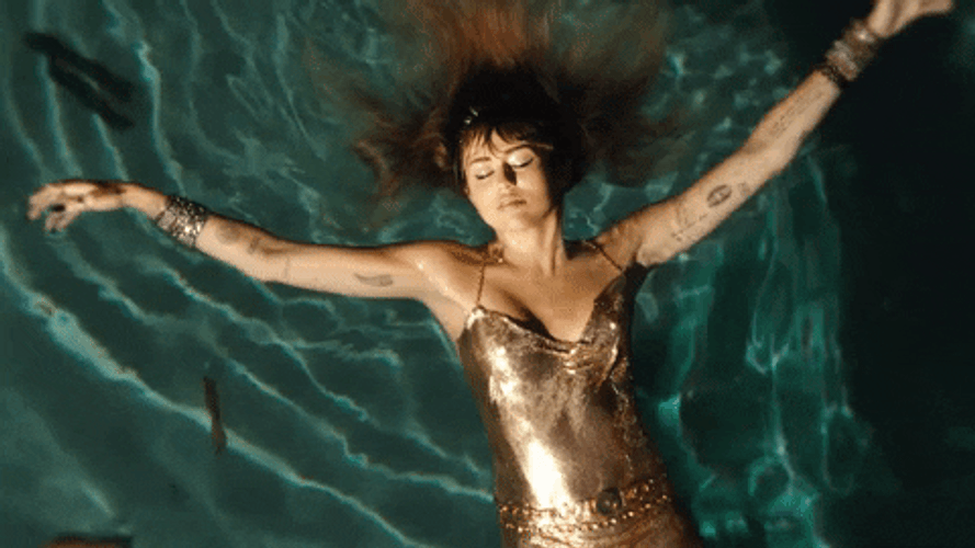 Miley Cyrus Floating On Water Music Video GIF
