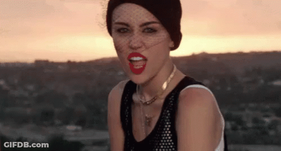 Miley Cyrus Playing With Tongue GIF