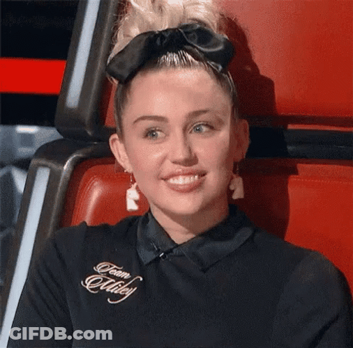Miley Cyrus Smiley Wink GIF