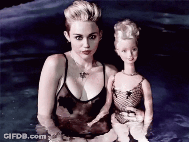 Miley Cyrus Swimming With Barbie GIF