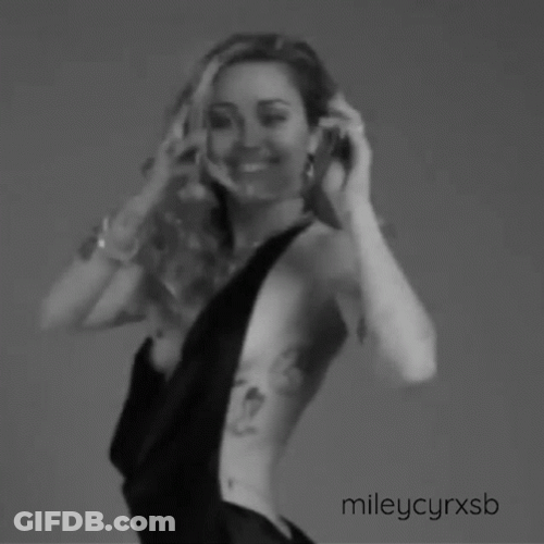 Miley Cyrus Wearing Crowns GIF