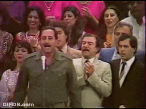 Military Man At Microphone Facing Crowd GIF