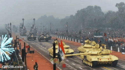 Military Vehicles Parade With Fireworks GIF