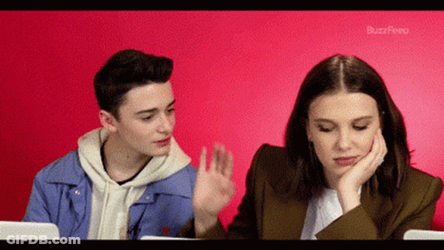 Millie Bobby Brown Pushing Noah Schnapp GIF