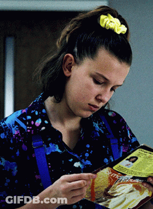 Millie Bobby Brown Reading Magazine GIF