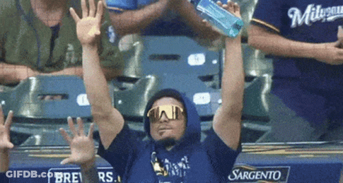 Milwaukee Brewers Fan In Sunglasses And Hooded Shirt GIF