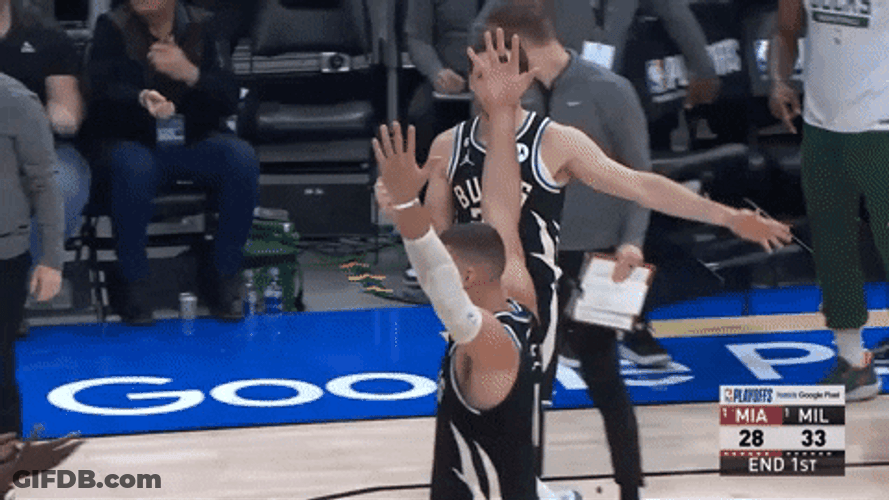 Milwaukee Bucks Jrue Holiday Brook Lopez Low Five GIF