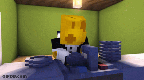 Minecraft Character Sitting At Desk With Yellow Block GIF