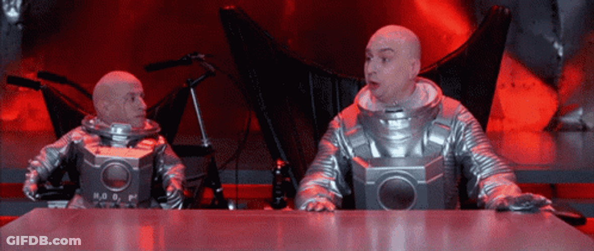 Mini Me And Dr Evil Wearing Space Suit GIF