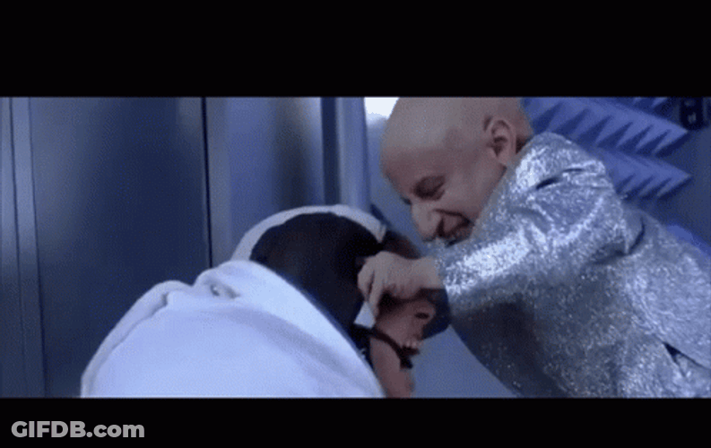 Mini Me Beating Austin Powers GIF