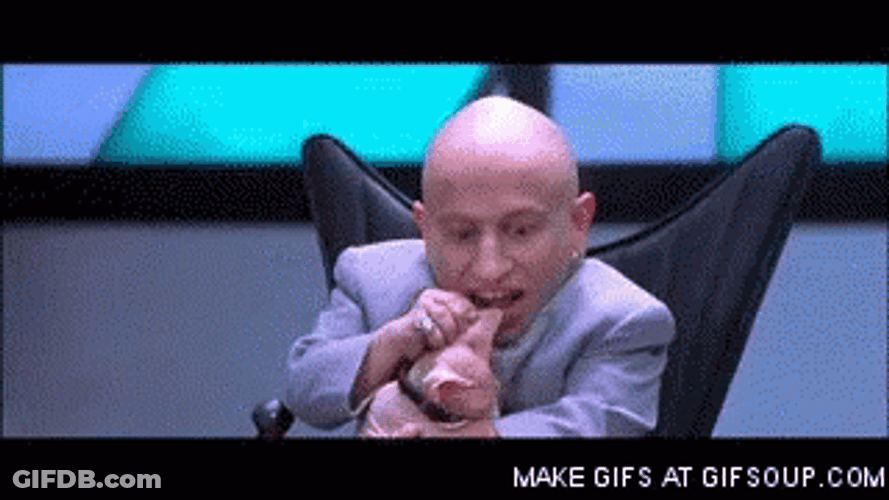 Mini Me Gnawing Cat Ears GIF