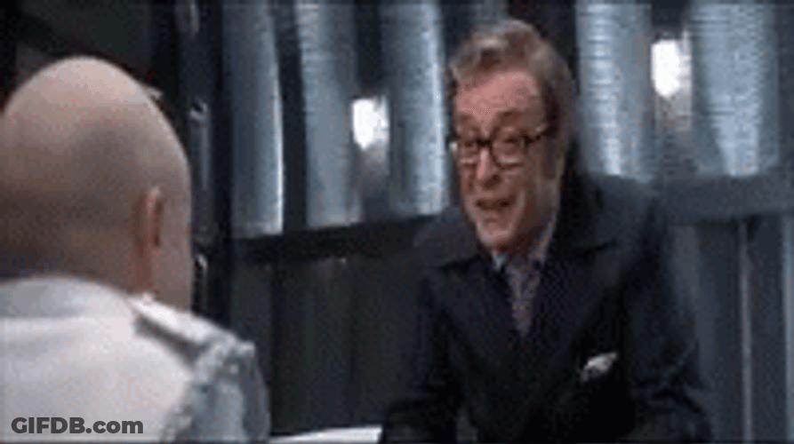 Mini Me Laughing With Nigel Powers GIF