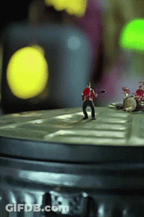Miniature People Groovy On Tin Can GIF