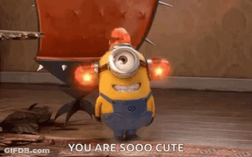 Minion Standing In Front Of Cactus GIF